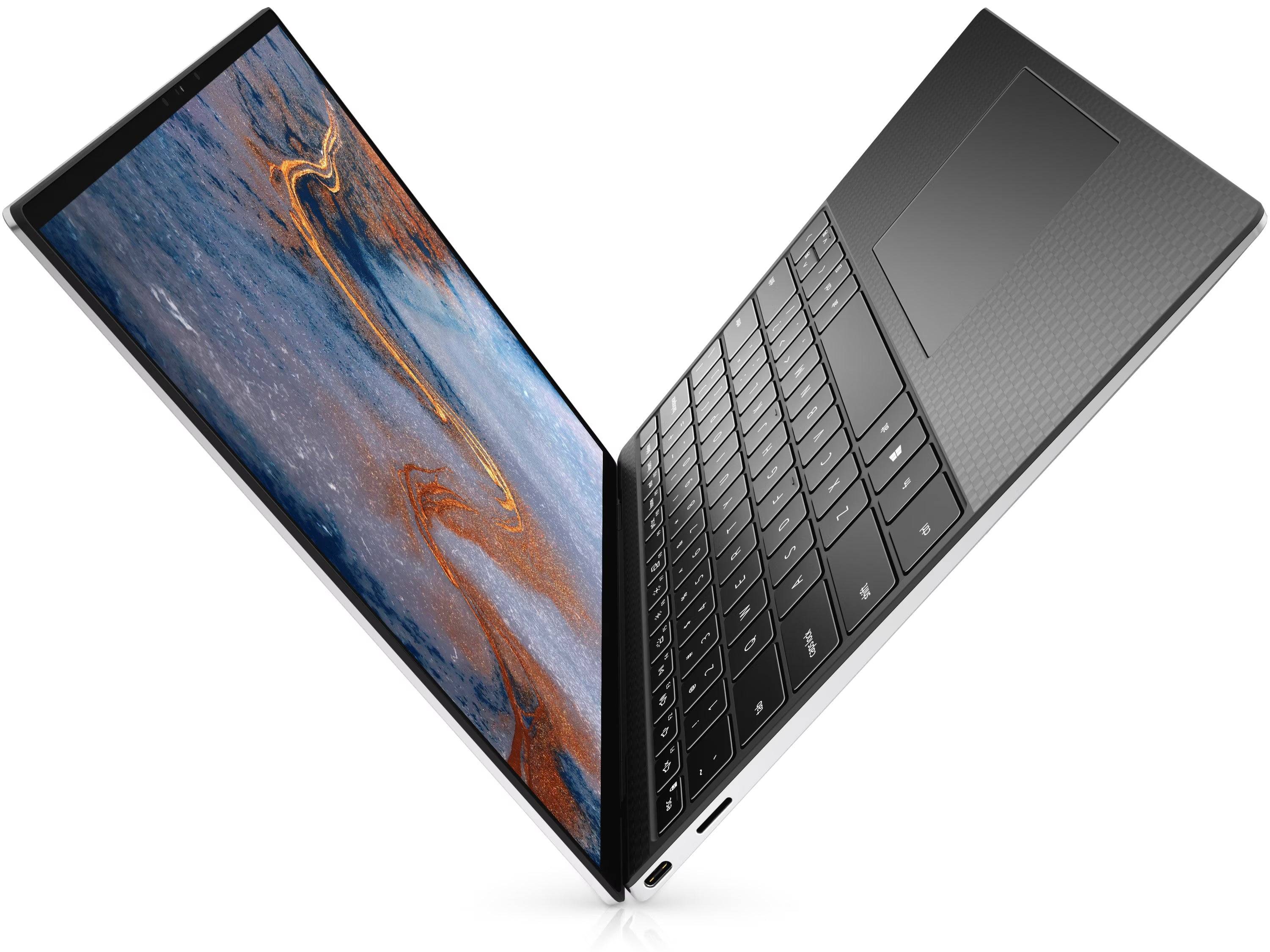 Vista laterale inclinata del Dell XPS 13 4K, design sottile e raffinato con porte USB-C, perfetto per lavoro e mobilità.