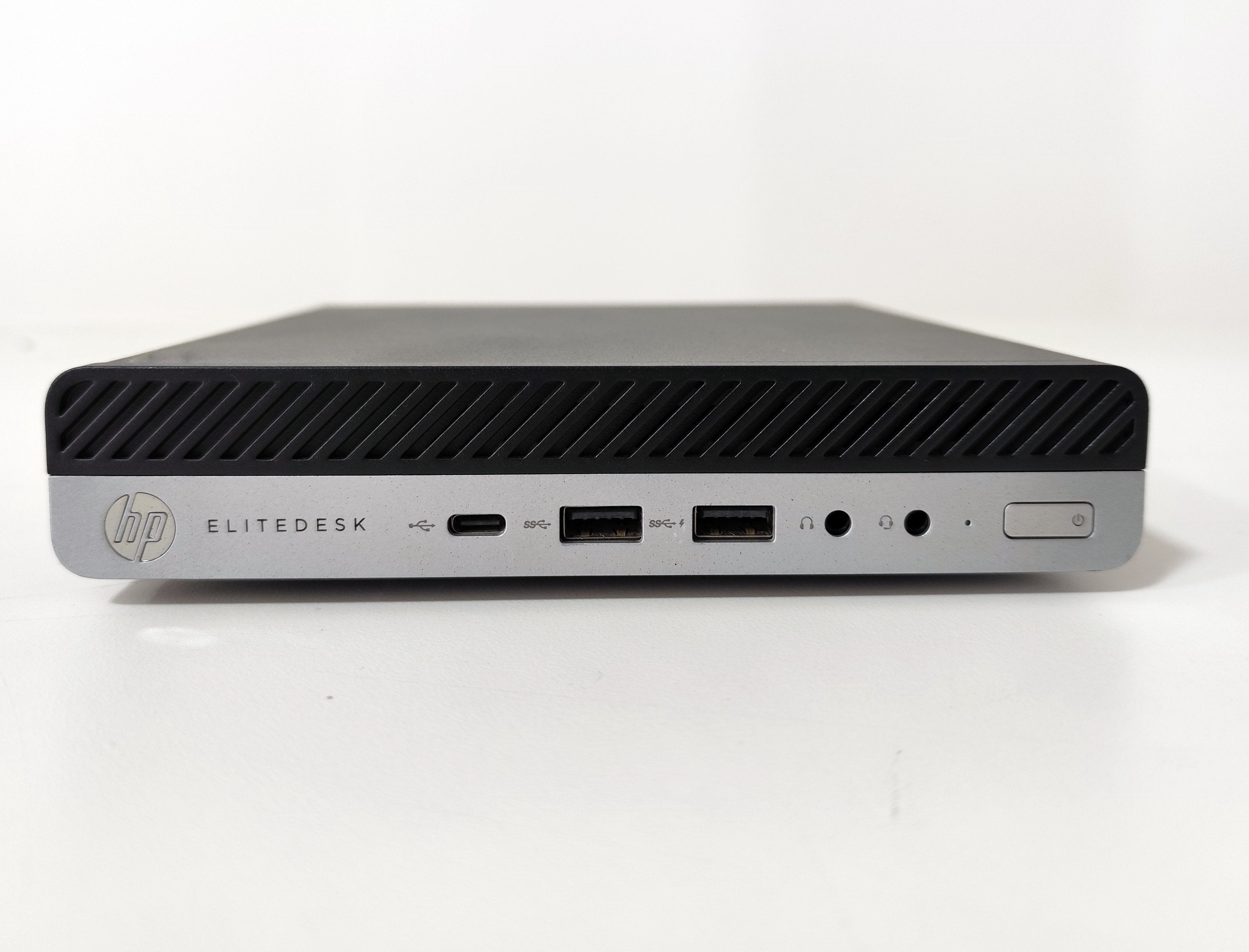 HP EliteDesk mini desktop PC front view with USB ports, featured on Messoanuovo.it